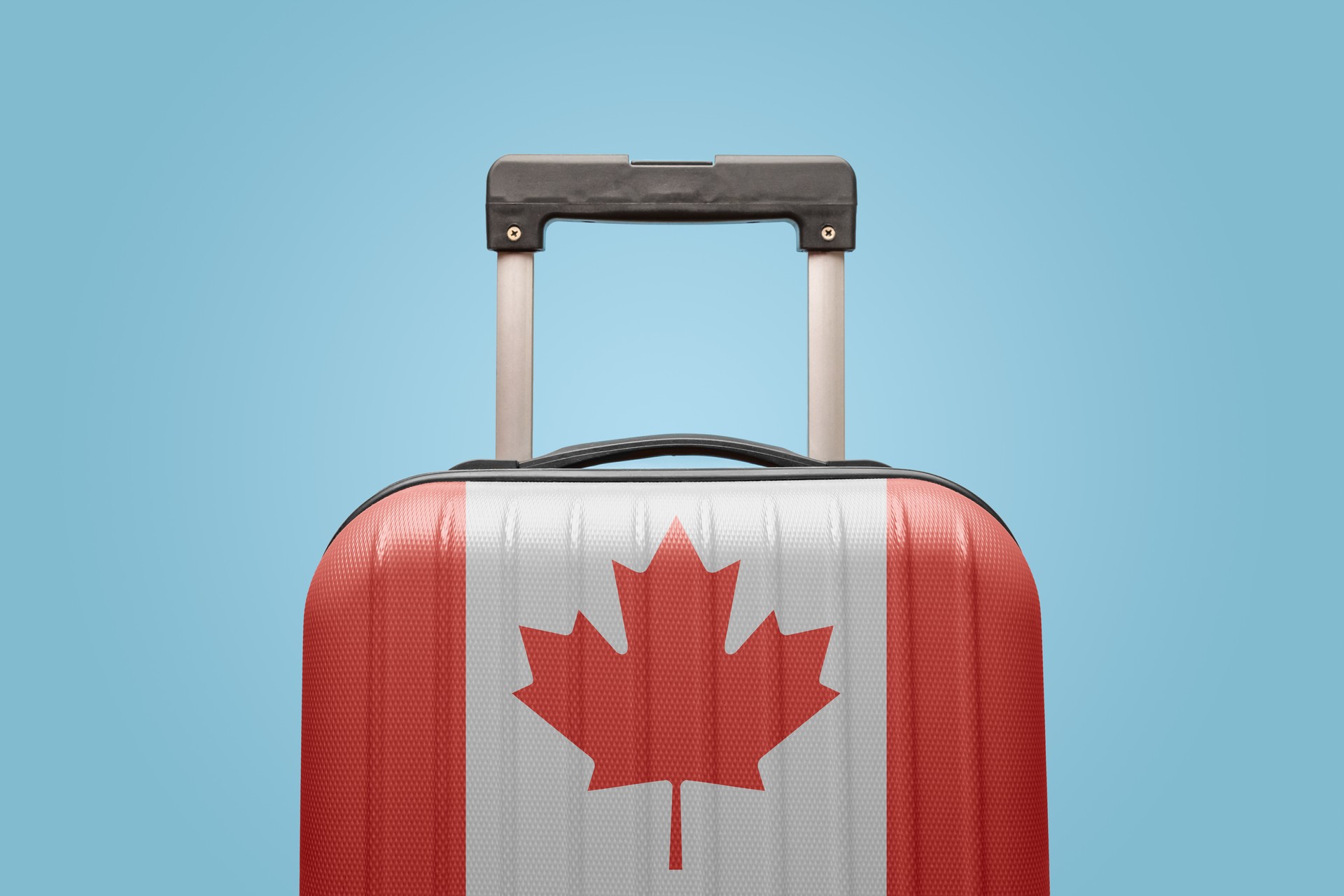 Baggage with Canada flag print tourism and vacation concept.